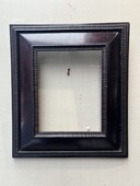 Carved and Blackened Wooden 