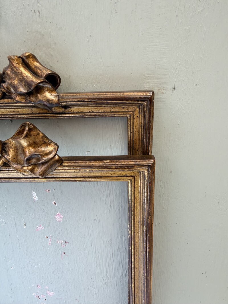 Pair of golden wooden frames from the 19th century